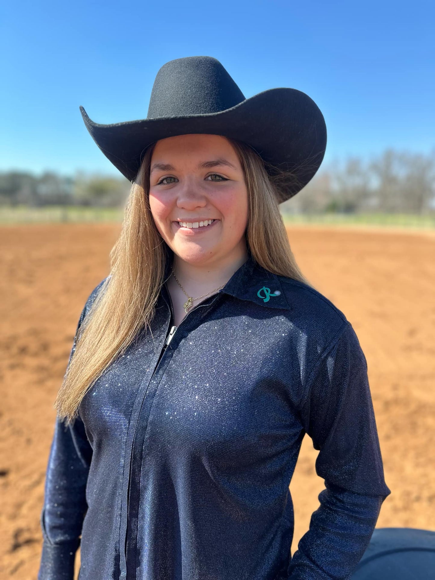 The Blue Graceland Show Shirt, a vibrant and elegant new color addition to the Graceland collection, featuring breathable and moisture-wicking fabric, perfect for equestrian shows and everyday wear.