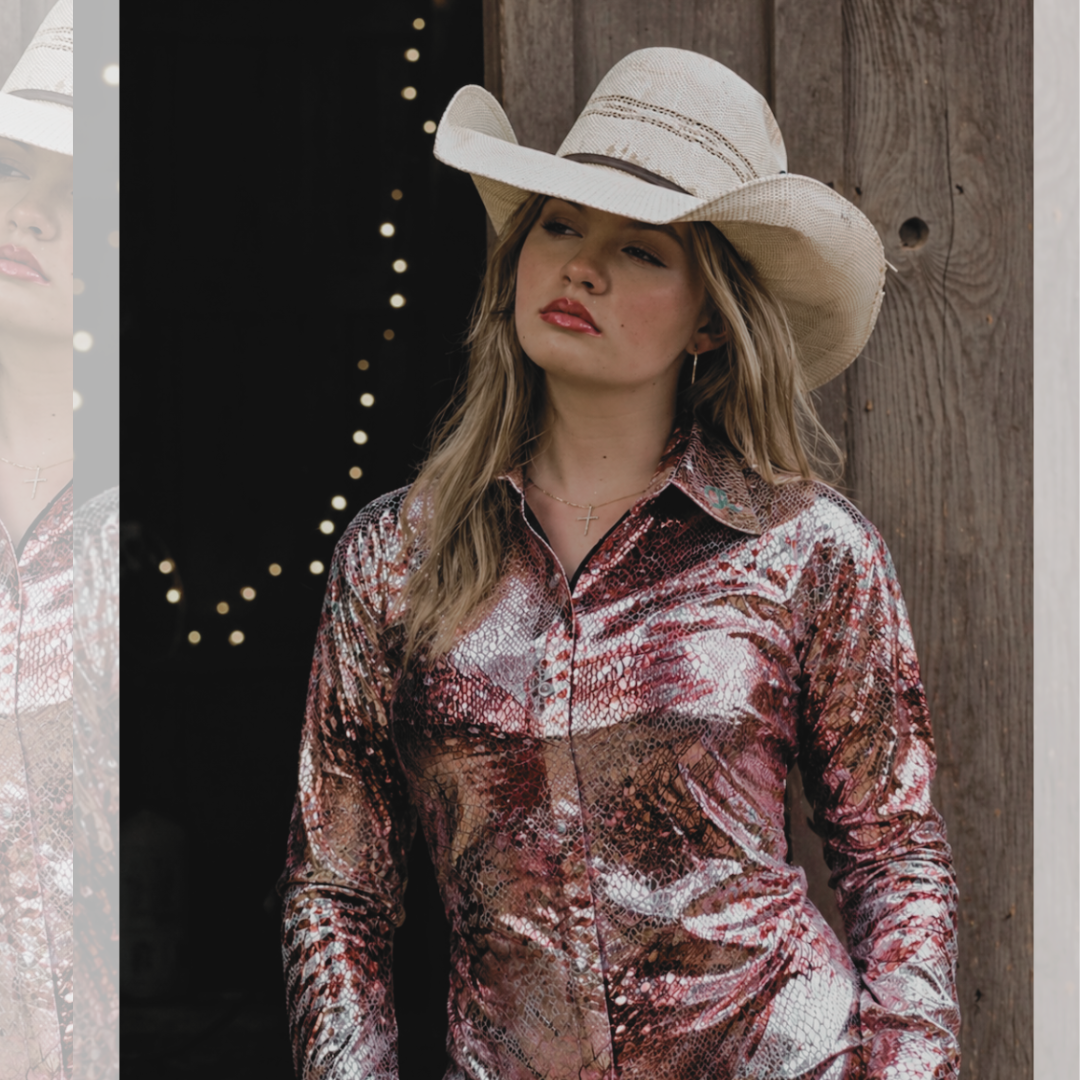 Rider in a copper western show shirt beside her horse at golden hour