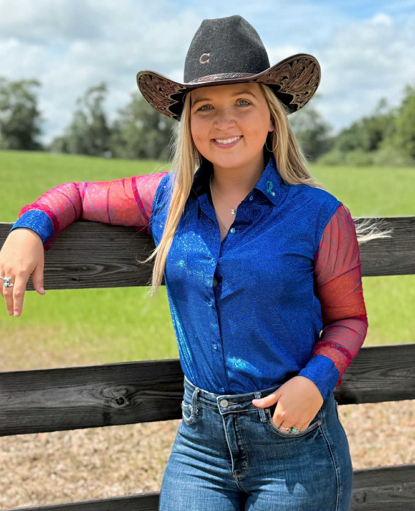 Starstruck Wrangler barrel racing show shirt in royal blue with sheer red star-patterned mesh sleeves