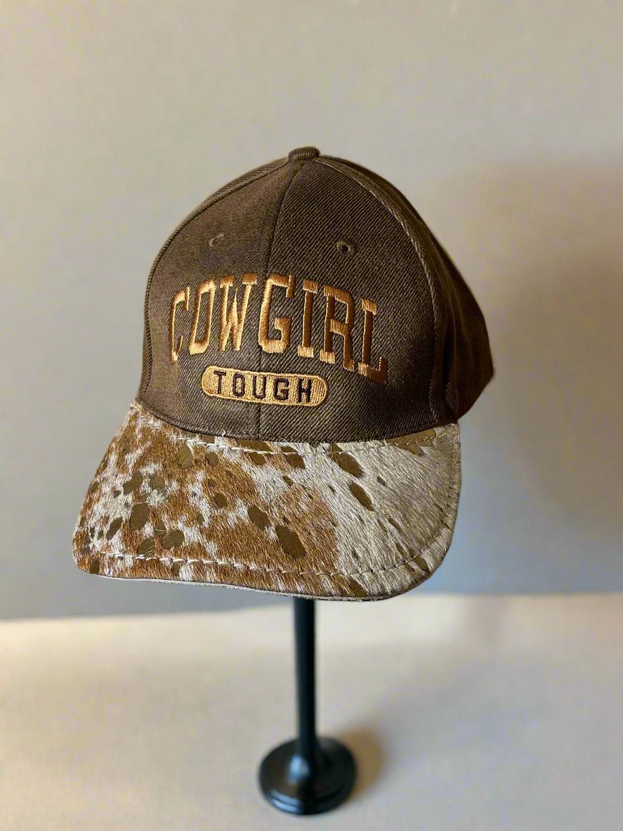 Cowgirl Tough Ball cap on hat stand
