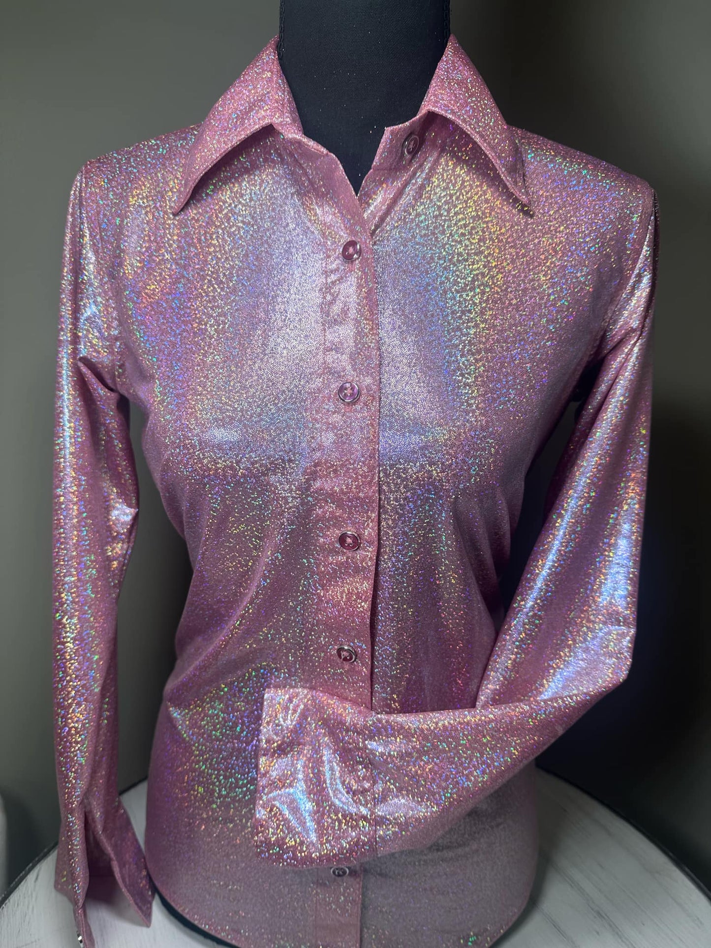 This stunning iridescent pink shirt shimmers and sparkles under the arena lights, guaranteeing all eyes are on you.